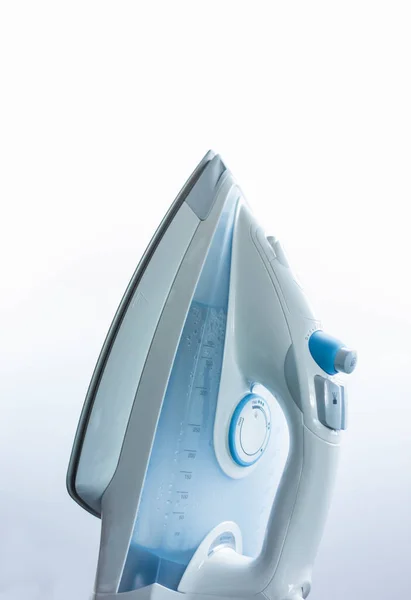 Steam iron on a white background