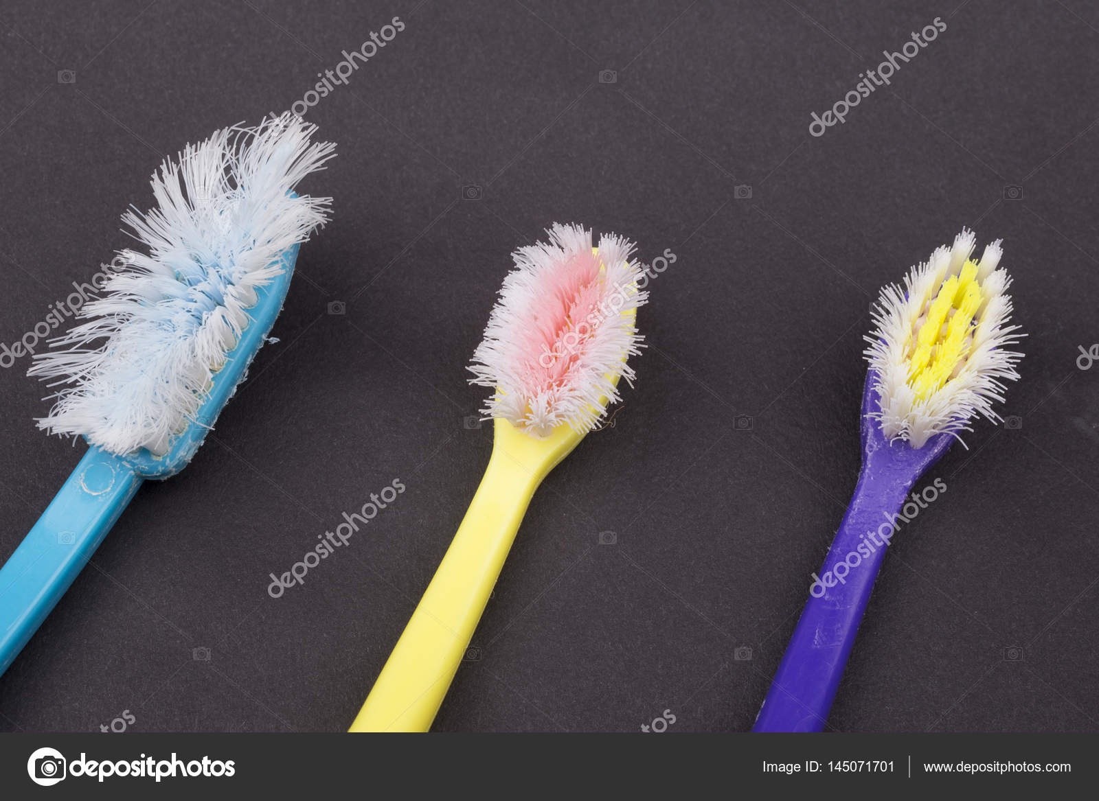 Used plastic toothbrushes Stock Photo by ©Taborsky 145071701