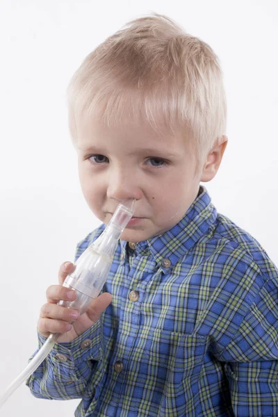 Boy and nasal aspirator — Stock Photo, Image