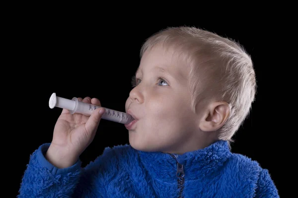 Child taking medicine — Stock Photo, Image