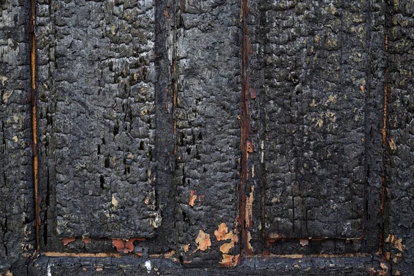 Charred wall as a background — Stock Photo, Image