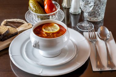 Restaurant menu. White ceramic bowl with hot soup Hodgepodge, br clipart