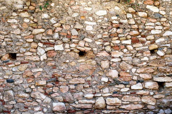Каменная стена в возрасте, серо-коричневый фон . — стоковое фото