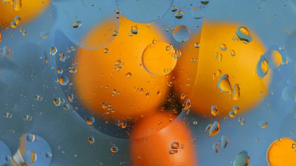 Reflejo Los Ciclos Amarillo Naranja Agua Aceitosa Efecto Abstracto Puede — Foto de Stock