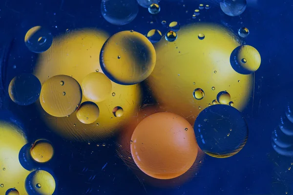 Κίτρινο Και Πορτοκαλί Cicles Αφηρημένη Επίδραση Στο Μπλε Φόντο Εχθρική — Φωτογραφία Αρχείου