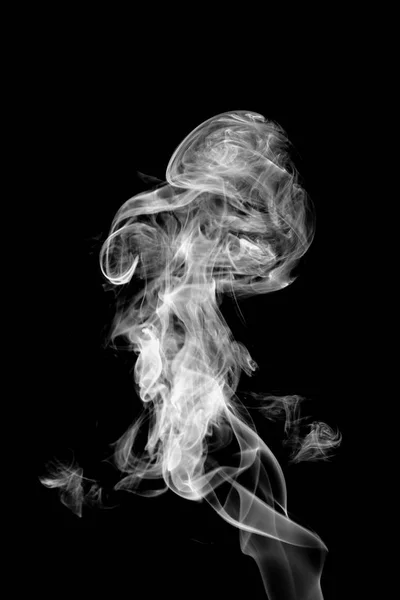 Дым на тёмном фоне — стоковое фото