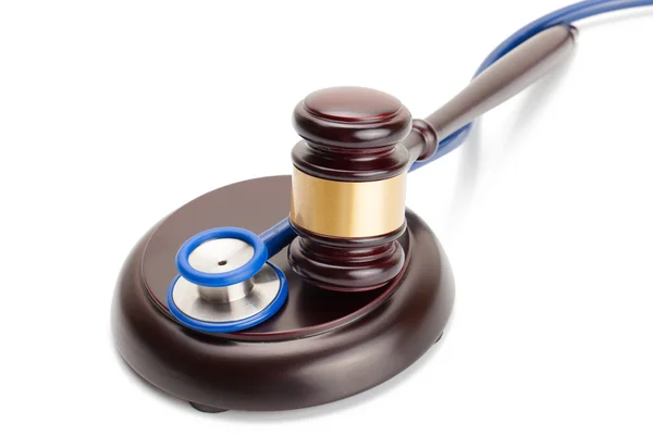 Studio shot of judge gavel and stethoscope — Stock Photo, Image