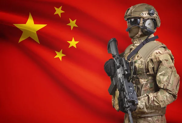 Soldier in helmet holding machine gun with flag on background series - China