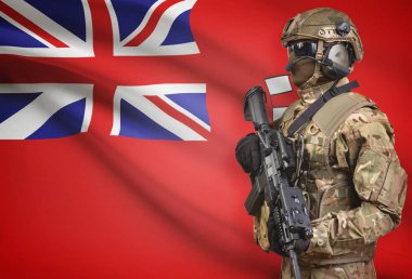 Asker makineli tüfek Kanada eyaleti bayrak ile arka plan serisi - Manitoba tutan kask içinde