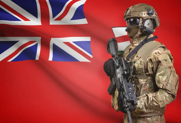 Soldier in helmet holding machine gun with Canadian province flag on background series - Ontario — Stock Photo, Image