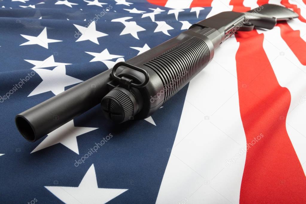 Shotgun without lables over USA flag