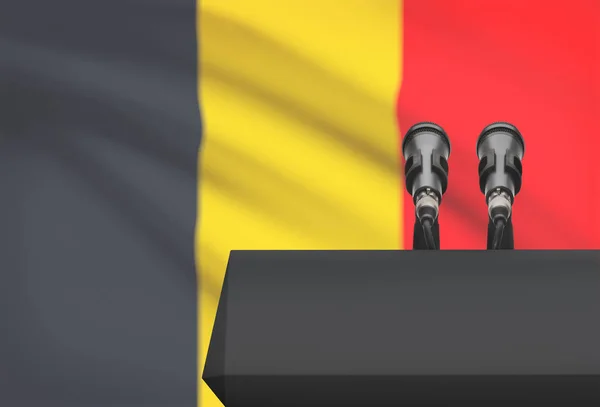 Kanzel und zwei Mikrofone mit einer Nationalflagge auf Hintergrund - Belgien — Stockfoto