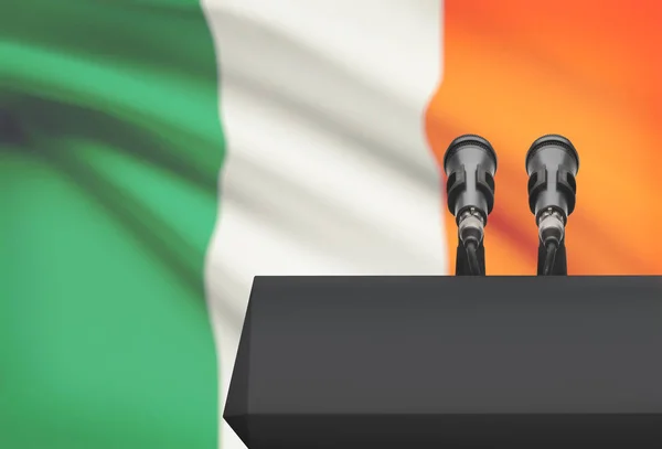 Pulpit and two microphones with a national flag on background - Ireland — Stock Photo, Image