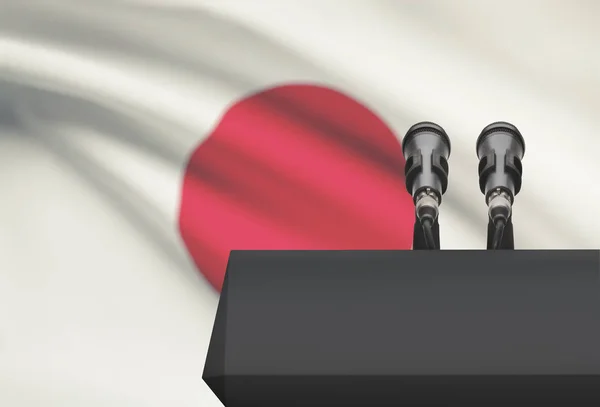 讲坛和两个麦克风与国旗上的背景-日本 — 图库照片