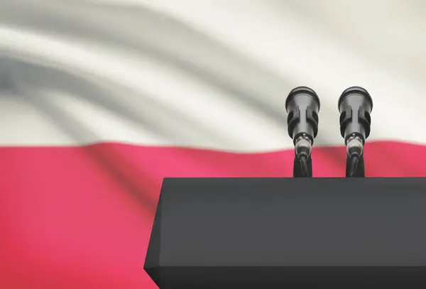 Pulpito e due microfoni con una bandiera nazionale su priorità bassa - Polonia — Foto Stock