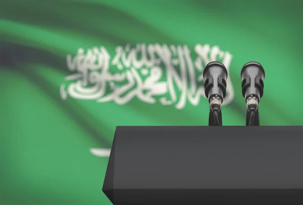 Pulpit and two microphones with a national flag on background - Saudi Arabia — Stock Photo, Image