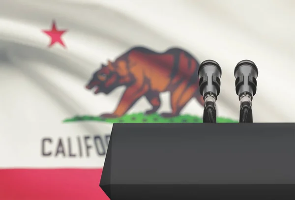 Pulpit and two microphones with USA state flag on background - California — Stock Photo, Image