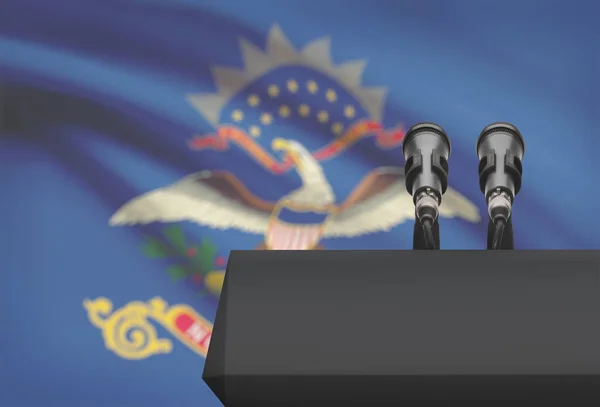 Pulpit and two microphones with USA state flag on background - North Dakota — Stock Photo, Image