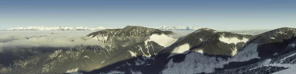 Panoramic view from top of Chopok mountain at Jasna Nizke Tatry resort area, Slovakia. Filtered image: cross processed vintage effect. — Stock Photo, Image