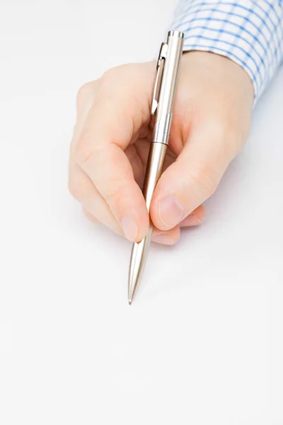 Man signing or writing something - close up shot over white — Stock Photo, Image