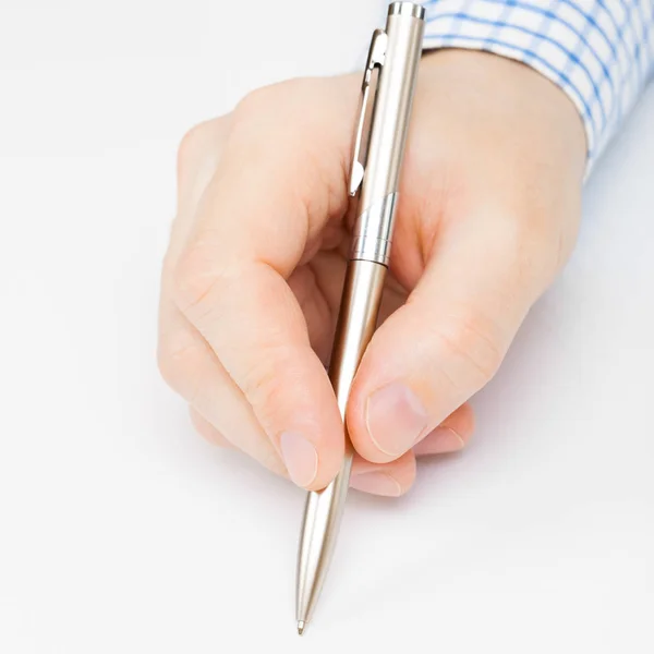 Close up shot of a man signing or writing something with a ball pen — Stock Photo, Image