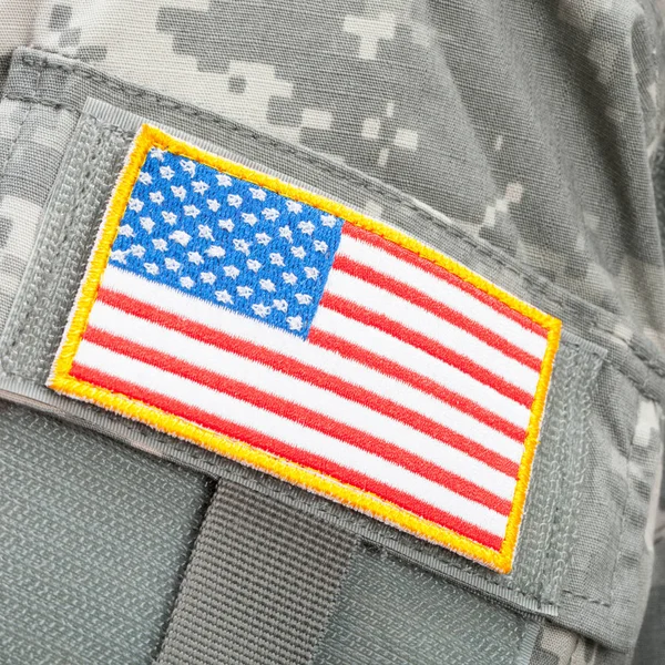 USA flag patch on solders uniform - close up studio shot — Stock Photo, Image
