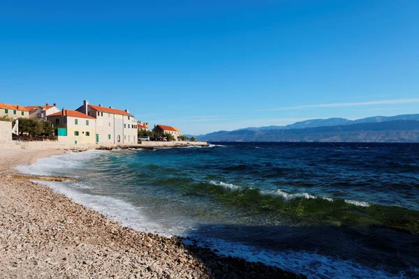 Cozy beach in a small town on Brac island - Croatia — Stock Photo, Image