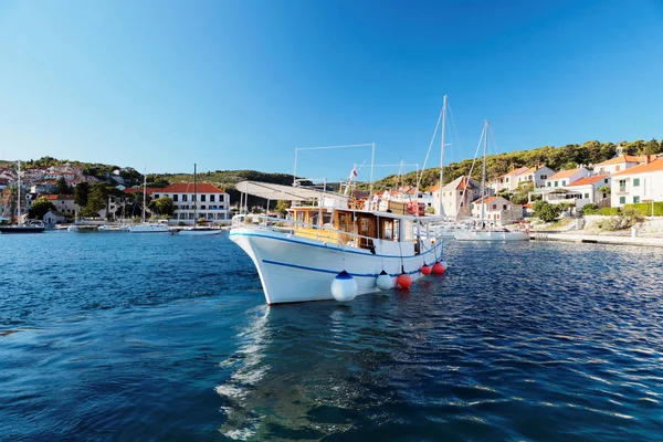 Tourist boat in the harbor of a small Postira town - Croatia, island Brac — Stock Photo, Image