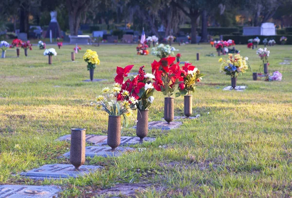 Crypts, tombs and flowers at a cemetery — Stock Photo, Image