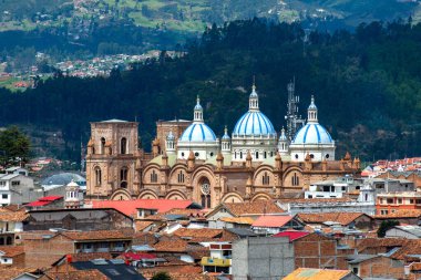 Cuenca's Cathedral La Inmaculada Concepcion, in middle of it's beautiful city, on a sunny and cloudy afternoon. Cuenca, Azuay Province, Ecuador. clipart
