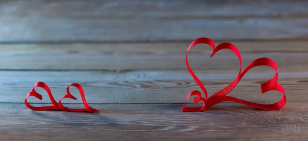 Ribbon Shaped Hearts on wood table