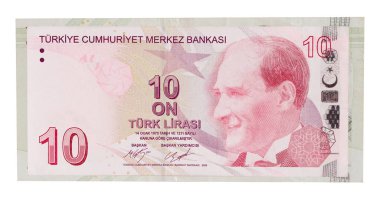 Ön tarafta 10 Türk Lirası, arka planda başka madeni paralar