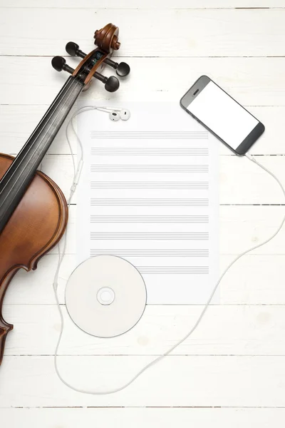 violin with  music paper note dvd disc and smart phone