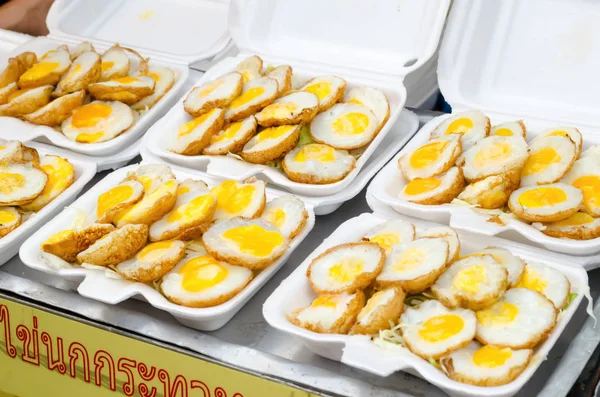 Selling Fried quail egg Thai food in foam container — Stock Photo, Image