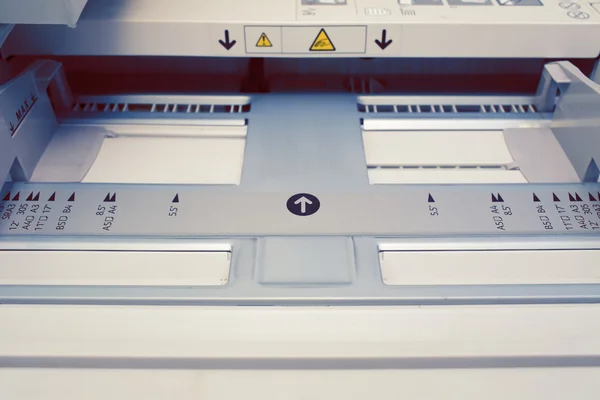 Paper tray in the printer