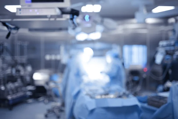 Teatro de operaciones en el hospital moderno, fondo desenfocado —  Fotos de Stock