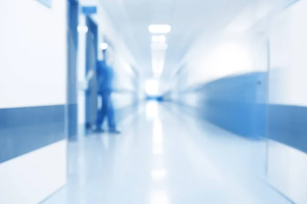 Personnel in hospital corridor, unfocused background — Stock Photo, Image