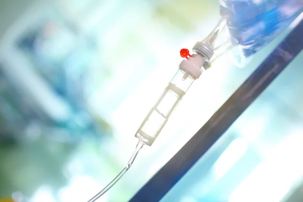 Intravenous drip system on the blurred background — Stock Photo, Image