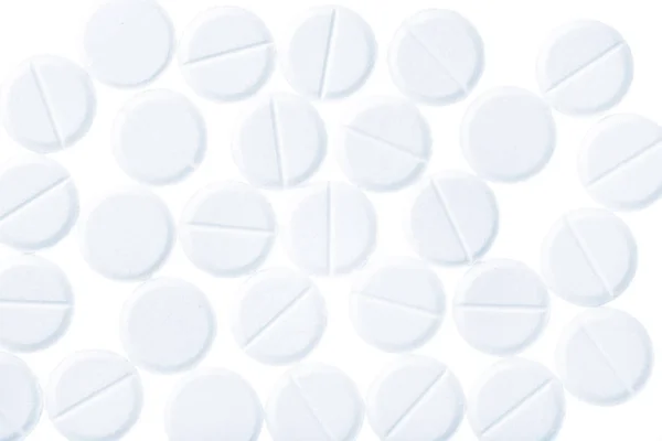 Medical pills of round shaped isolates on white — Stock Photo, Image