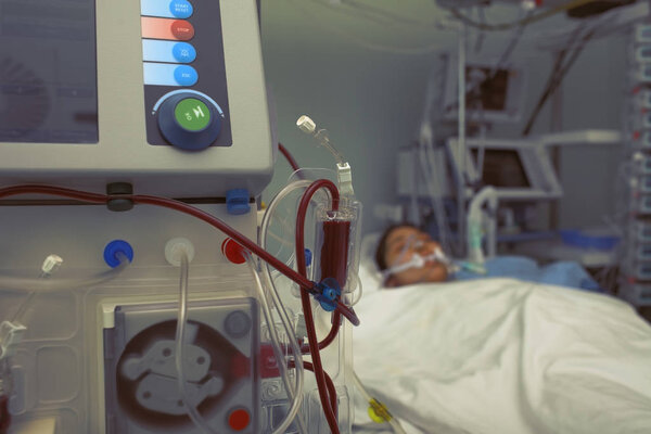 Blood filtration of patient in bed