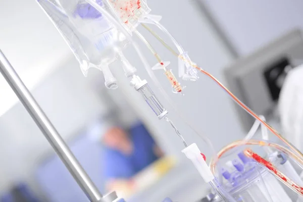 Iv drip bags on the rack — Stock Photo, Image