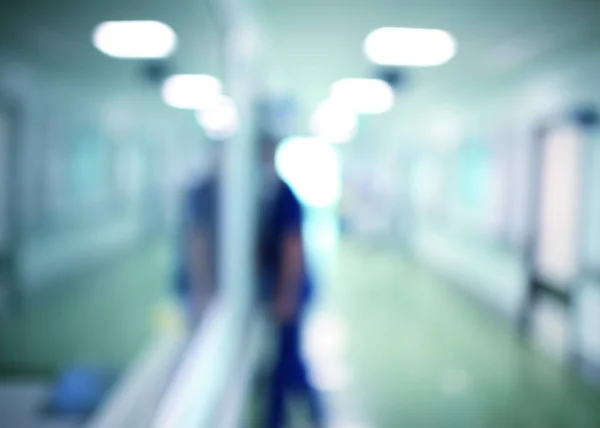 Doctor on the night duty in the hospital, unfocused background — Stock Photo, Image