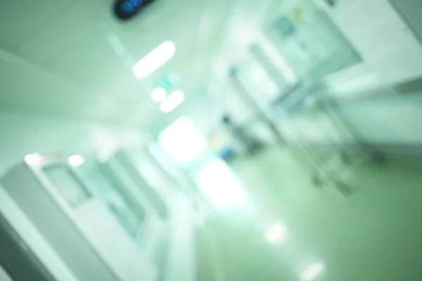 Salão de edifício médico iluminado, fundo desfocado — Fotografia de Stock