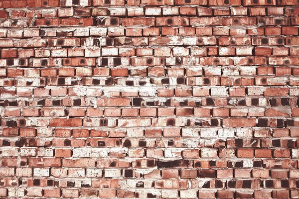 Ziegelwand mit gebrauchten Ziegeln ausgekleidet, strukturierten Hintergrund mit leeren — Stockfoto