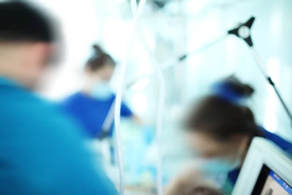 Working medical personnel in the hospital, unfocused background — Stock Photo, Image