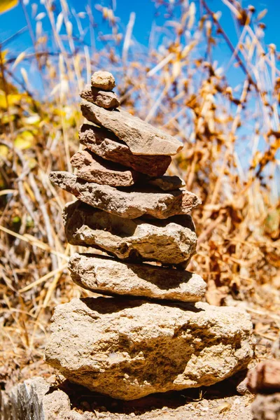 stone pyramid, brown stones stacked on top of each other