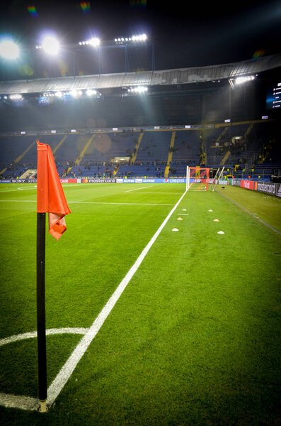 KHARKIV, UKRAINE - FEBRUARY 21, 2018: Corner flag overlooking the gates at OSK Metalist stadium, Ukraine