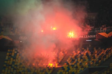 LVIV, UKRAINE - November 07, 2019: Ultras Centetien Fire Fighter Harness and Lights during the UEFA Europa League match between Alexandria vs AS Saint Etienne, Ukraine