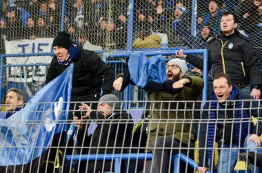 KHARKIV, UKRAINE - December 11, 2019: Atalanta Bergamasca Calcio BC fans and ultras support their team during the UEFA Champions League match, Ukraine