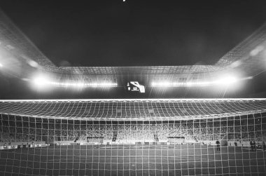 LVIV, UKRAINE - November 07, 2019: Night football stadium close up behind the gate during the UEFA Europa League match between Alexandria (Ukraine) vs AS Saint Etienne (France), Ukraine